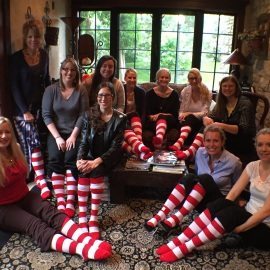 Michigan Cerebral Palsy Attorneys Rocks Striped Socks for Ronald McDonald House